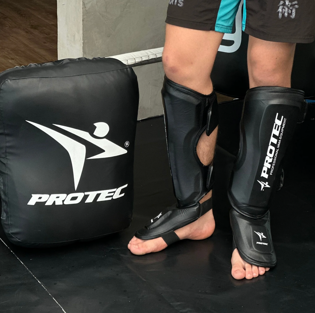 ESPINILLERA CON EMPEINERA PARA MMA